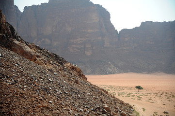 Red mountains of the canyon of Wadi Rum desert in Jordan. Wadi Rum also known as The Valley of the...