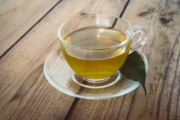 cup of tea on a wooden table.