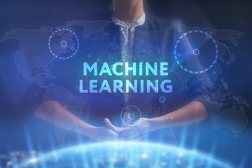 The concept of business, technology, the Internet and the network. A young entrepreneur working on a virtual screen of the future and sees the inscription: Machine learning