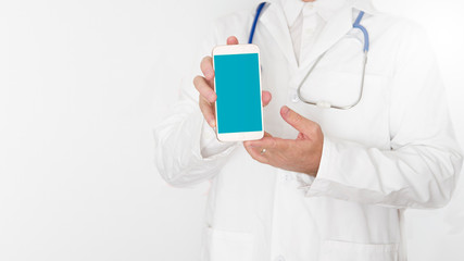 Doctor in a hospital holding a smartphone with an medical app. Empty copy space for Editor's text.