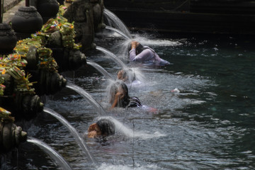 Cleansing at the Tirta Empul water temple in Bali, Indonesia