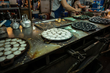 Closeup picture of traditional Thai dessert called Kanom Crok made from coconut milk