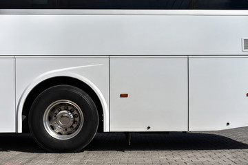 side of a white bus © Oleksandr