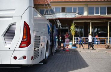 tail light of modern white bus on bus station © Oleksandr