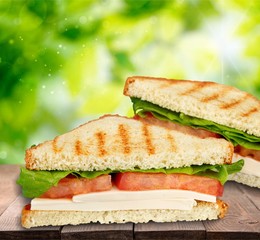 Fresh tasty sandwiches on  background