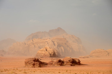  Jordanian desert in Wadi Rum, Jordan. Wadi Rum has led to its designation as a UNESCO World Heritage Site. It is known as The Valley of the Moon