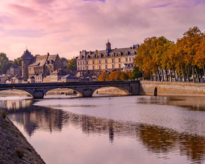 Obraz premium Scenes from Laval France along the Mayenne river with castles and churches