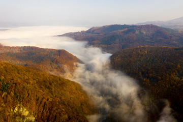 Jiului Valley in the Carpathians on a foggy morning