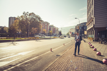 Obraz premium Modern man walking down the street