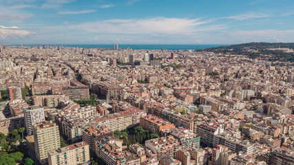 Fototapeta na wymiar Cityscape of Barcelona at sunny day. Aerial view