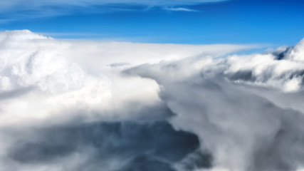 Fototapeta premium thunderstorm clouds sky aerial view with dramatic storm background panoramic overview from above and blue horizon weather nature theme pattern landscape bitmap design reference