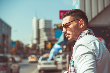 Good looking businessman in urban city