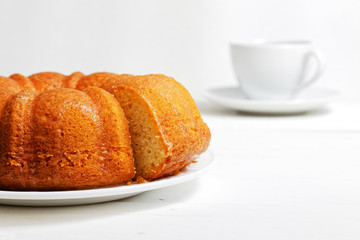 Closeup homemade lemon cake soaked with lemon syrup