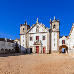 Fototapeta na wymiar Church and Pilgrim lodgings of Santuario de Nossa Senhora do Cabo Sanctuary. Cabo Espichel Cape. Baroque architecture. Sesimbra, Portugal