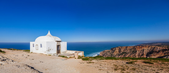 Ermida da Memoria or Memory Hermitage in the Nossa Senhora do Cabo or Pedra Mua Sanctuary. Espichel Cape and Atlantic Ocean. Sesimbra, Portugal © StockPhotosArt
