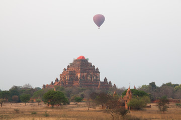 Hot air balloons rise over the plains of Bagan, a historical site in Myanmar, in the early morning
