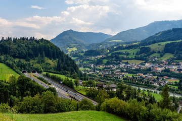 Beautiful view of mountains and entrance to autobahn tunnel near village of Werfen, Austria