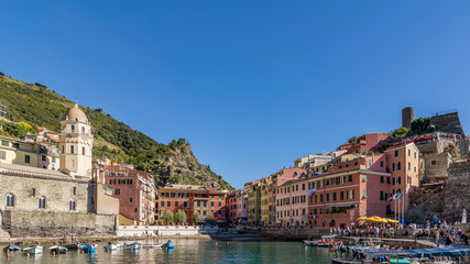 Fototapeta na wymiar The historic center of Vernazza on a sunny day and blue sky, Cinque Terre, Italy