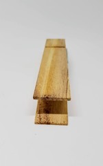 Over sized wooden clothes peg.