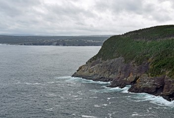 Fototapeta na wymiar landscape along the Killick Coast, near Church Cove seen from the Father's Trail Path, East Coast trail Avalon Peninsula; Newfoundland Canada