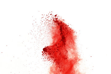 Red powder explosion on white background. Paint Holi.