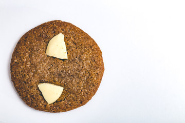 Chip cookie homemade with white chocolate isolated on white background.