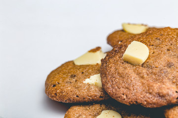 Chip cookie homemade with white chocolate isolated on white background.