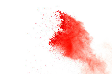 Red powder explosion on white background. Paint Holi.