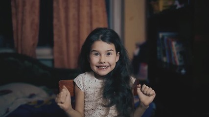 little girl of wonder spread her arms surprise. abruptness emotions little girl concept. Adorable happy surprised little girl child evening in the room indoors