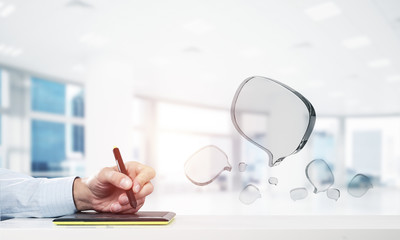 Male hands using graphics tablet and glass icons fly in air. Mix