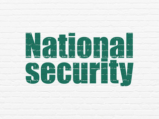 Obraz premium Privacy concept: Painted green text National Security on White Brick wall background