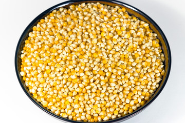 Beautiful plate with unpopped corn (popcorn kernel's)