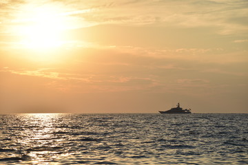 Fototapeta na wymiar Sunset, ship , sea