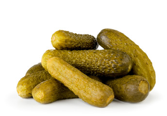 Bunch of pickled cucumbers close up on a white. Isolated.