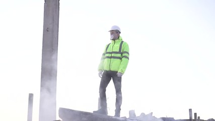lifeguard in a signal vest after an earthquake destroyed building Rescue teams