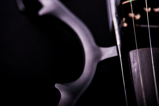 electronic violin on a black background