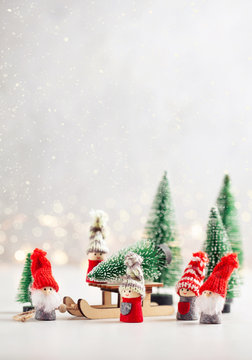Christmas background with miniature toys with wither scenes, seasonal Christmas, new year and winter decorations