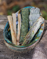 Smudge kit - Palo Santo sticks, Wildcrafted dried white sage (Salvia apiana), Mugwort (Artemisia vulgaris), and Siskiyou Cedar (Chamaecyparis lawsoniana) wrapped in organic hemp twine, Abalone shell. 