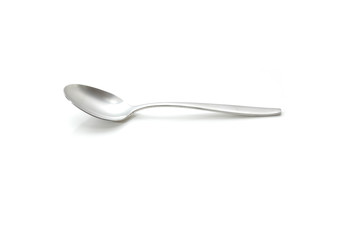 Single spoon agains a white background