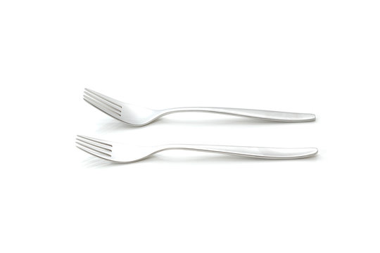Two forks agains a white background