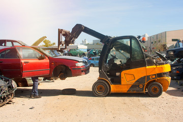  A graveyard of cars, broken cars sell on spare parts.