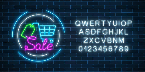Glowing neon sale sign with supermarket shopping cart and tag with alphabet. Neon light effects store basket.