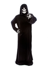Halloween costume of a skeleton grim reaper wearing a black robe on a white background pointing...