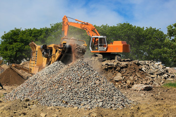 Stone crusher and crane in working
