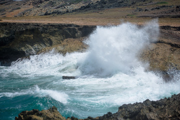 waves crashing on rocks