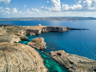 Fototapeta na wymiar Aerial drone photo - The famous Blue Lagoon in the Mediterranean Sea. Comino Island, Malta. 