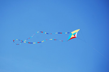 Fototapeta na wymiar A kite flying