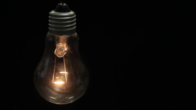 lamp lights up in the dark, the idea illuminates the space