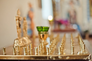 Candles in chandelier. Orthodox Church. bathing the into the baptismal font. Soft focus
