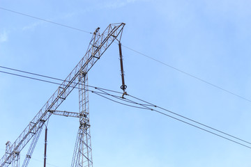 High voltage cables pylon in the field